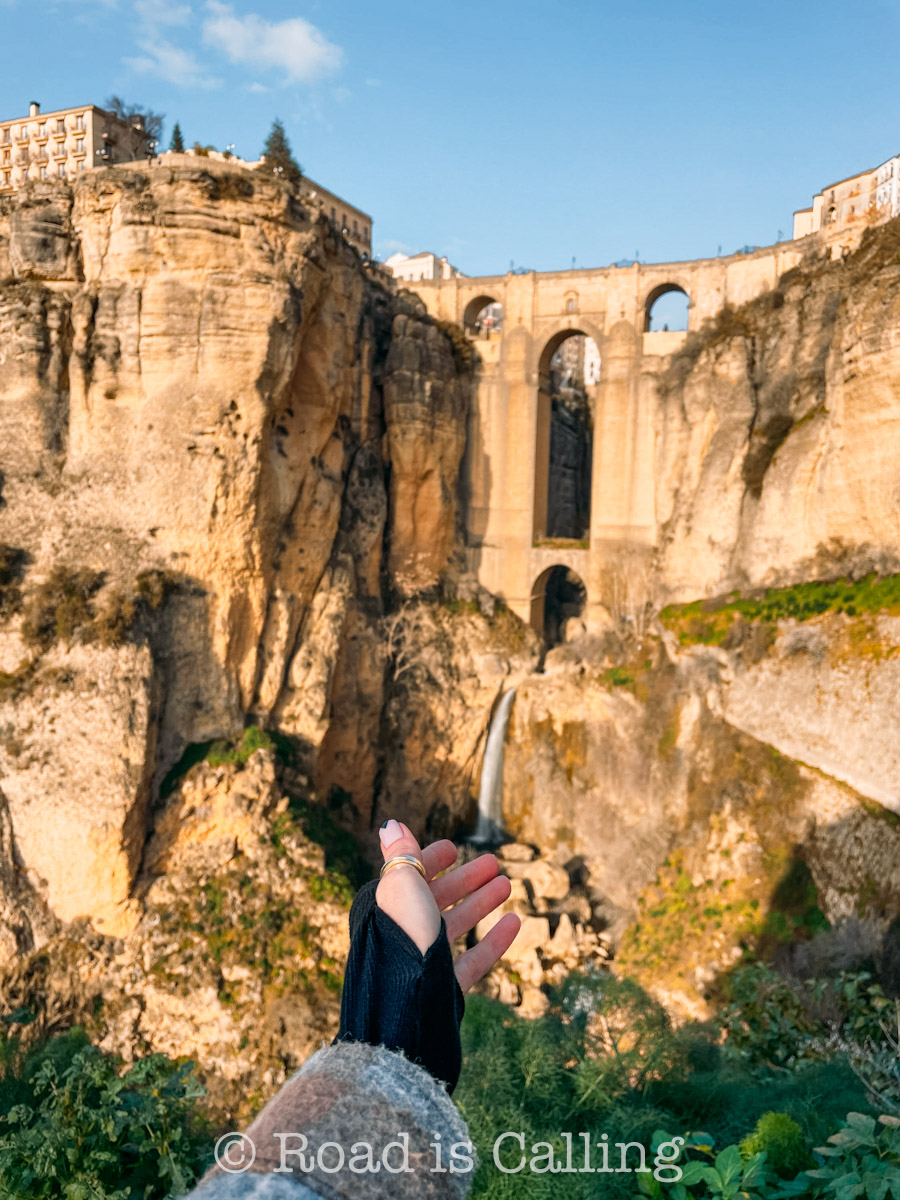 historic bridge in Ronda, Spain with dramatic cliffs and clear winter light