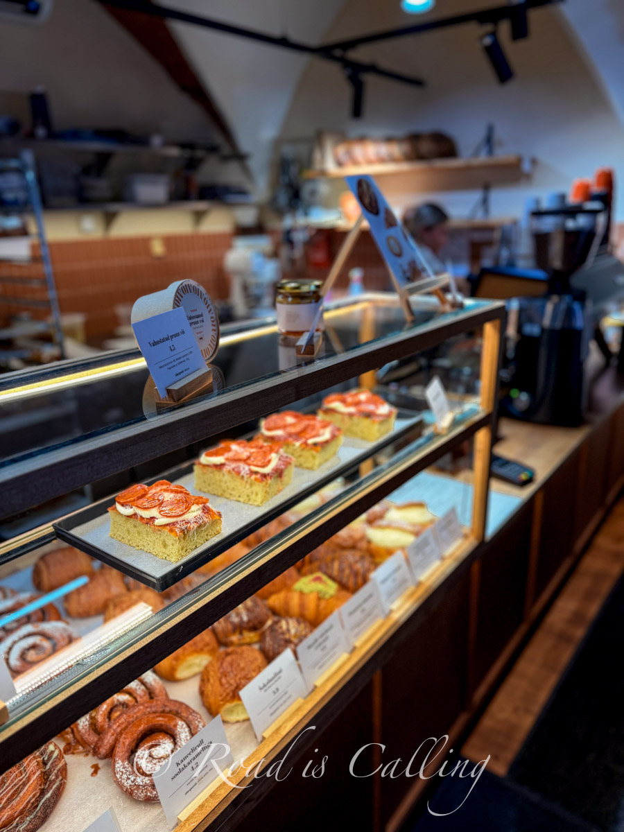 pastry display with sweet and savory baked goods in Cruffin cafe