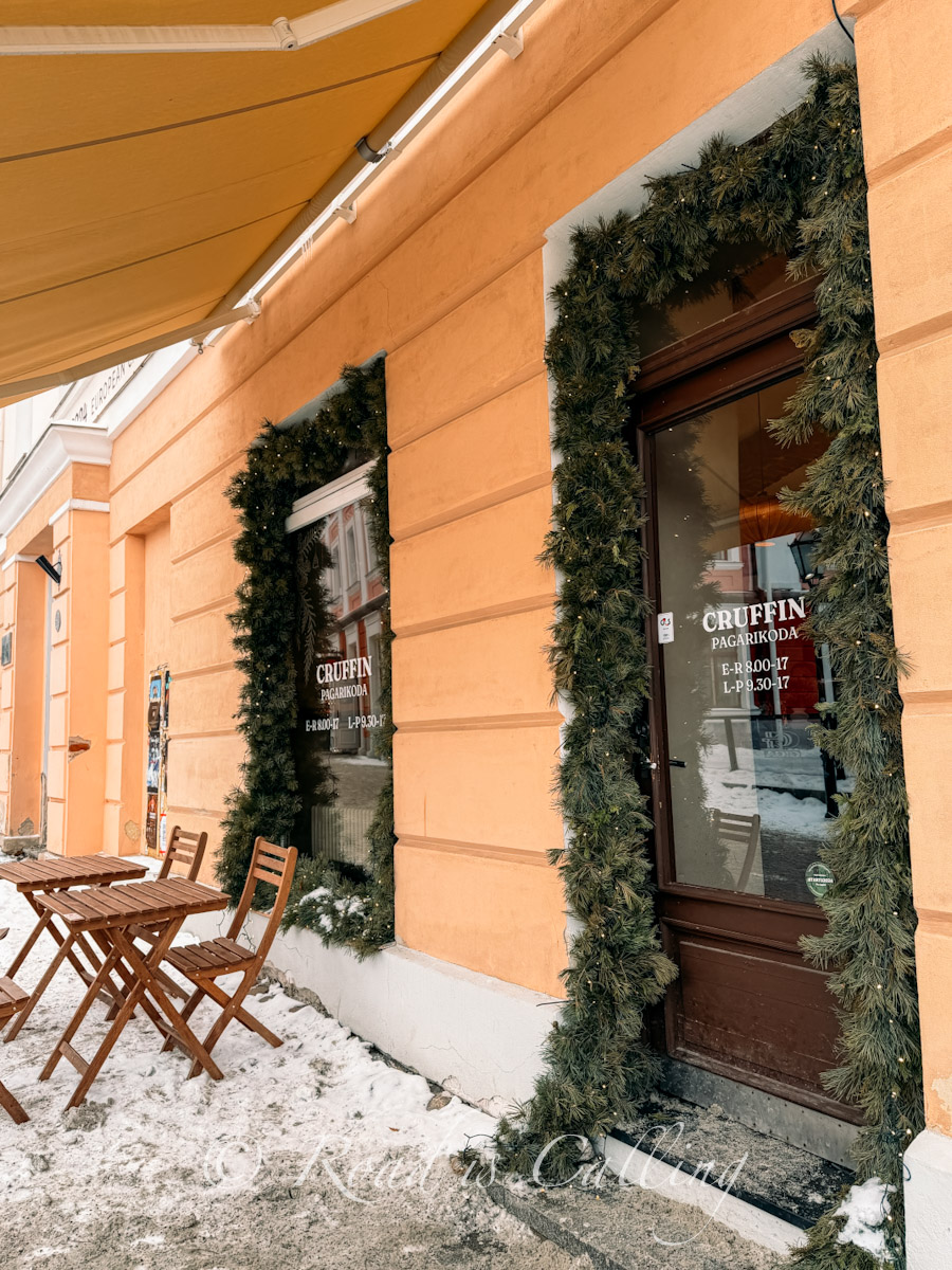 view of the front door of the Cruffin coffee shop in Tartu on the main square