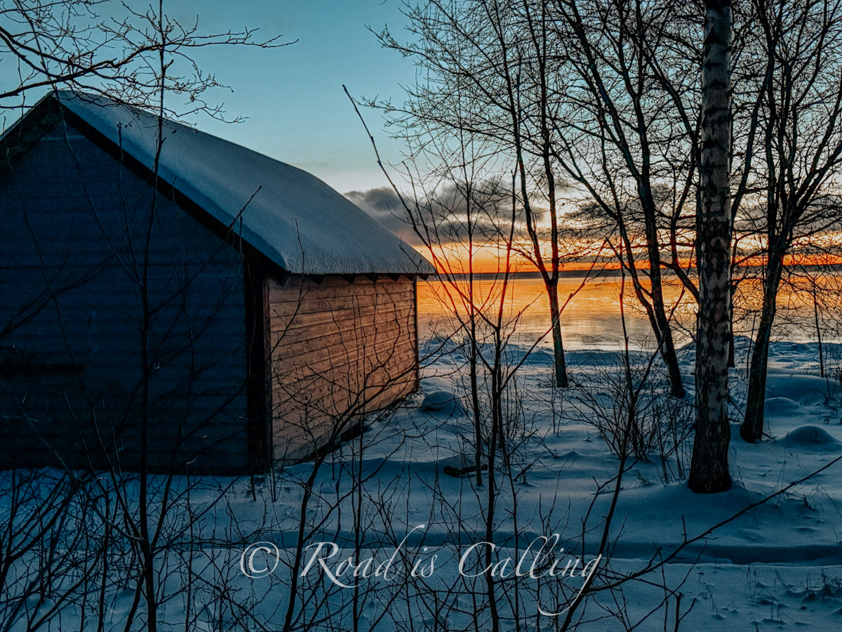 wooden house by the Baltic Sea at sunset in Estonia