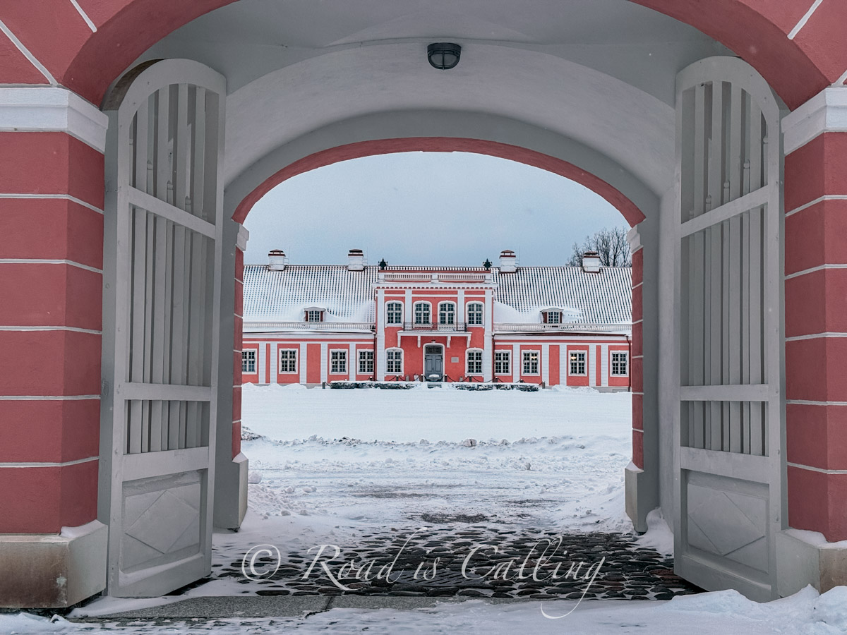 view of the Sagadi Manor through the gate in winter