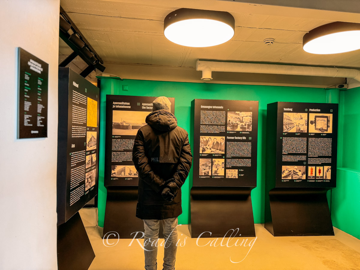 Mark reading info boards about Aparaaditehas modernized area