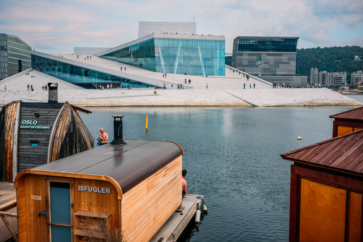 floating saunas on Oslo fjord in front of the Opera House and Sorenga wharf