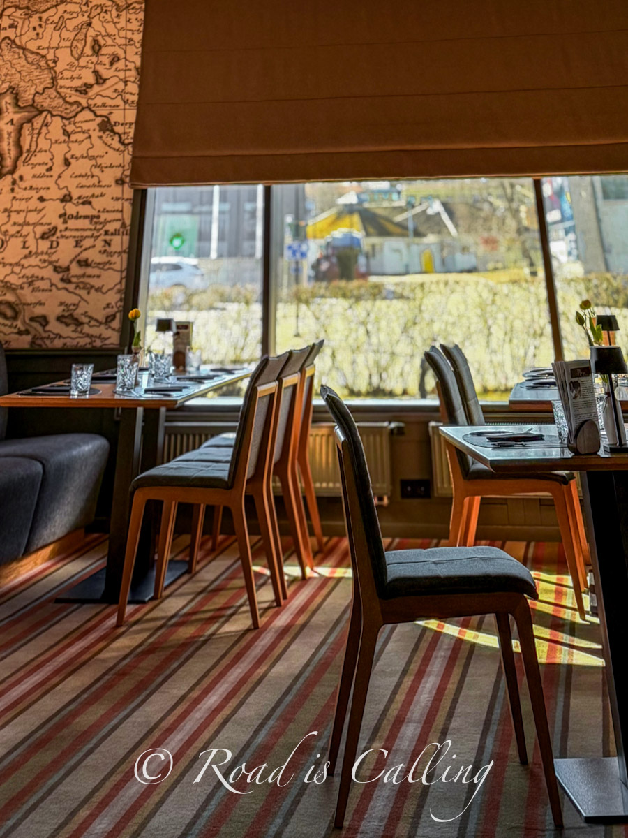 Dining area at Ugandi Resto with window view, best place to eat in Otepaa