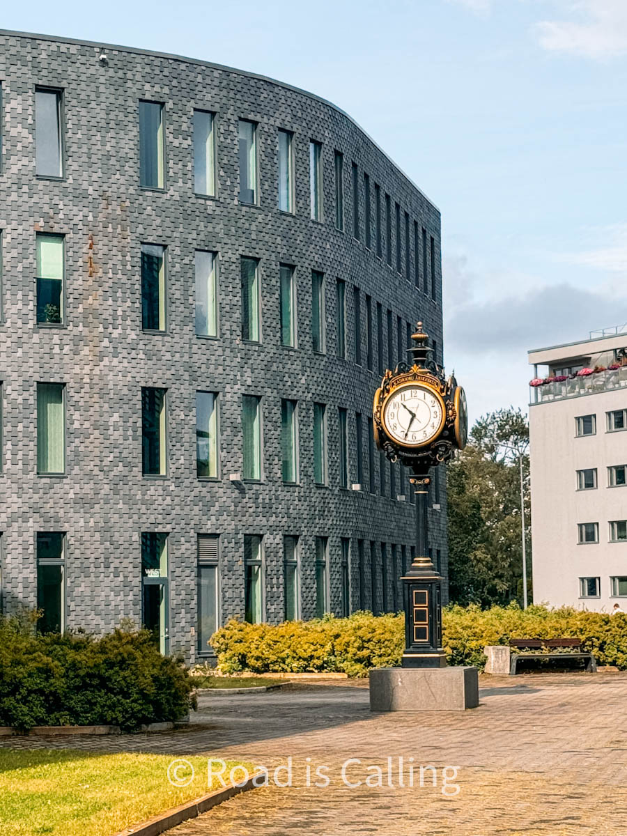 a residential building in Tallinn and a clock