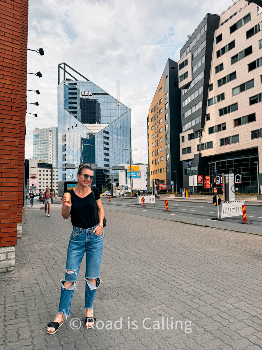 girl on the streets of Tallinn in warm weather