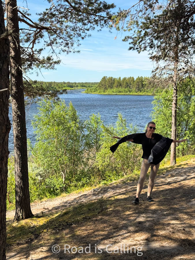 me standing in the forest near the river on a Lapland cheap trip in summer