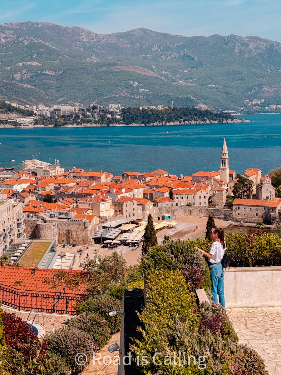 view of Budva Old Town with red rooftops and adriatic sea in Montenegro in October