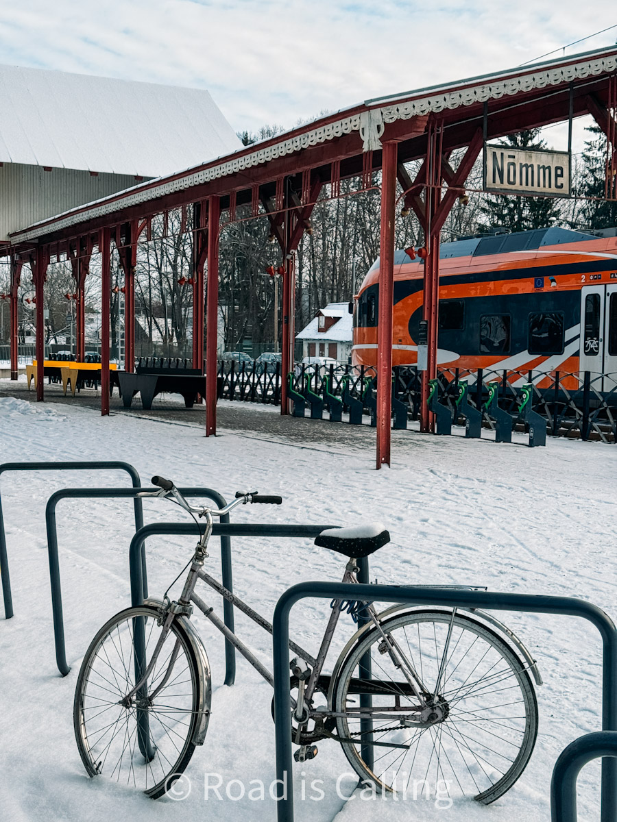 bike parked on snow on the train station in Nomme