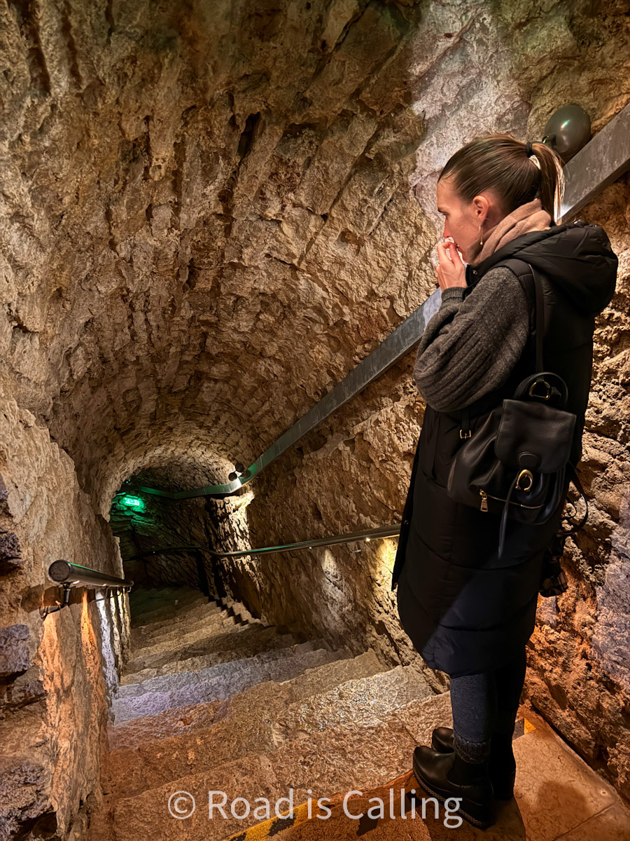 wаlking through Tаllinn Old Town's secret underground pаssаges