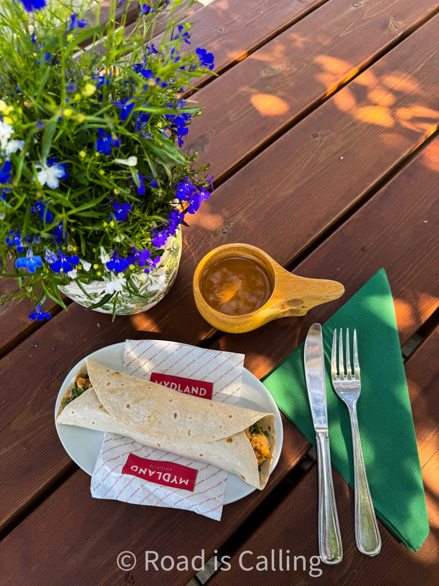 Norwegian meal with coffee at outdoor cafe during a Tromso trip
