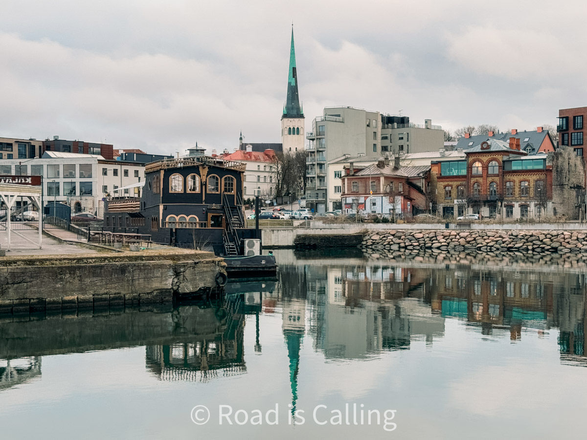 Colorful buildings and historic ship restaurant on the waterfront in Kalamaja, Tallinn