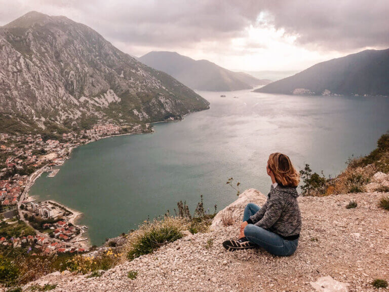 girl on a cliff in Montenegro