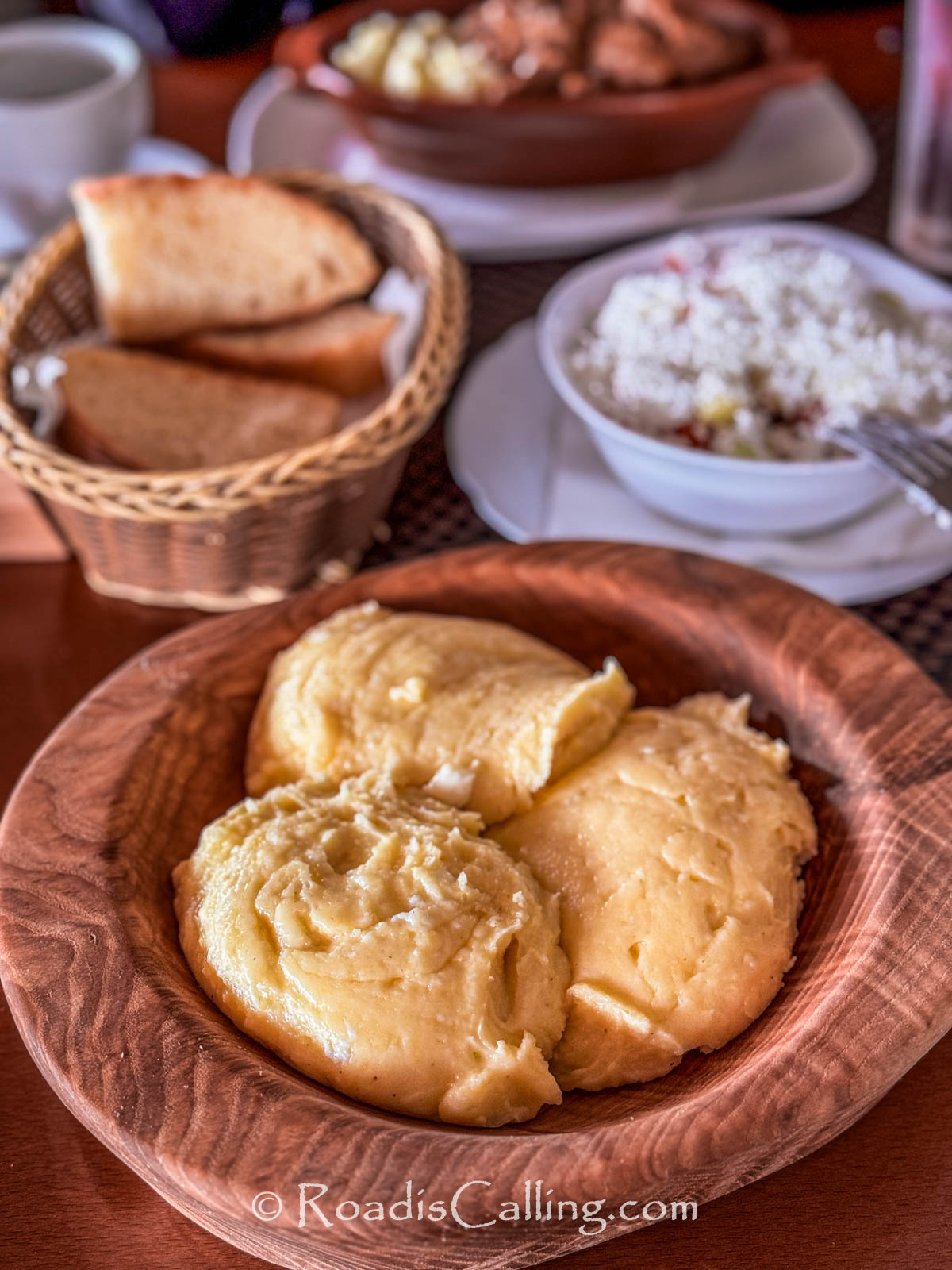 eating Civcara dish in Montenegro