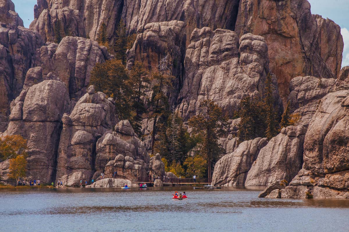 kayaking on a lake in Cluster State Park by the rocky mountains