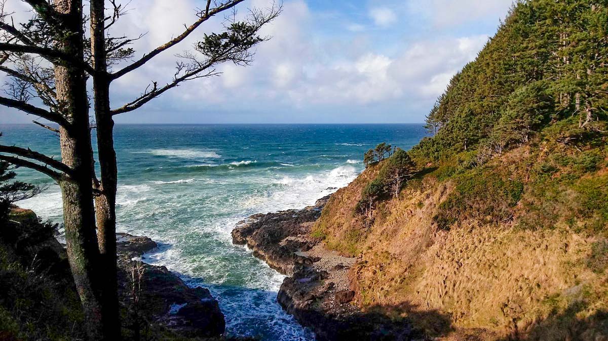 view of the ocean and cliffs
